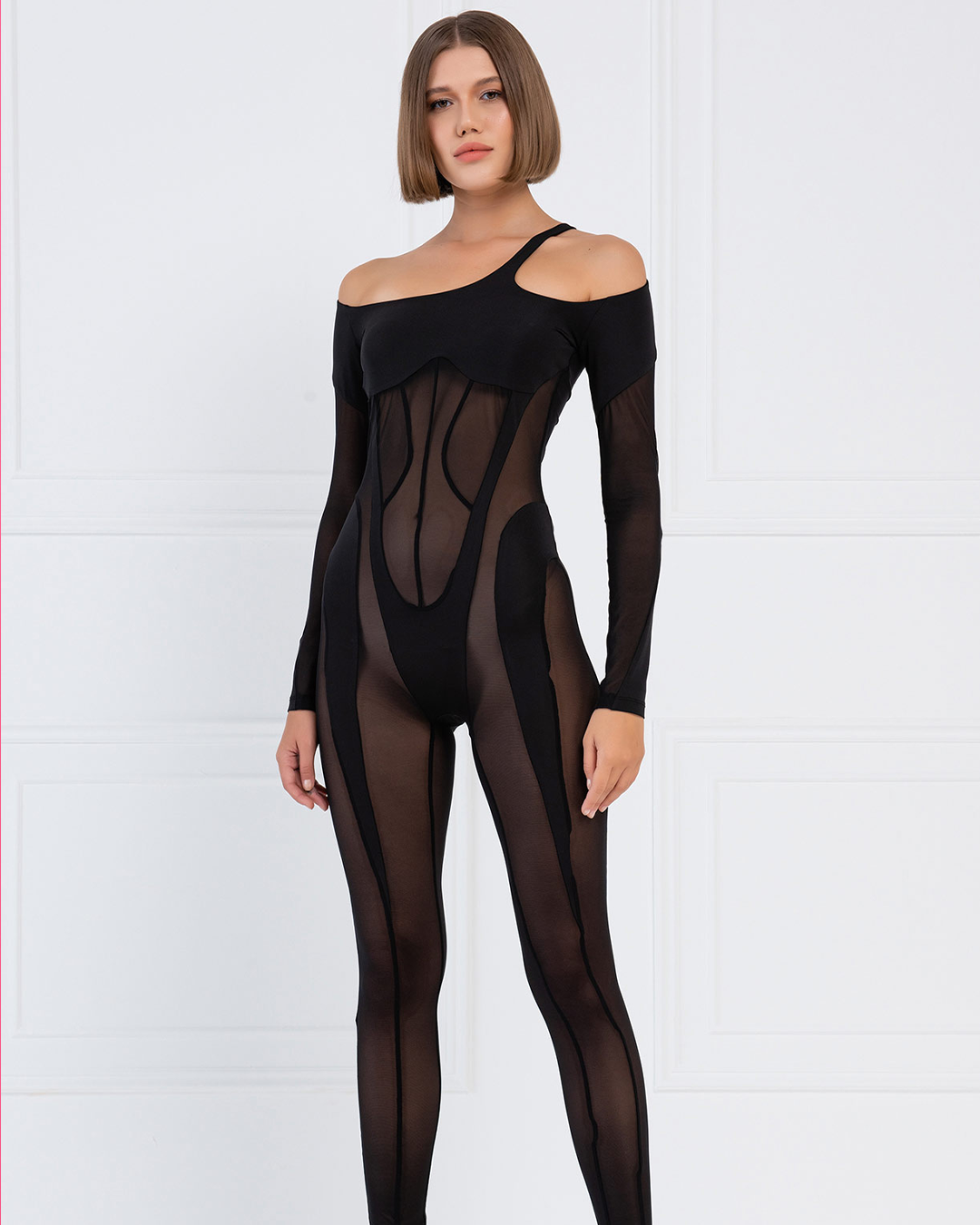 Catsuit transparent à épaules découpées